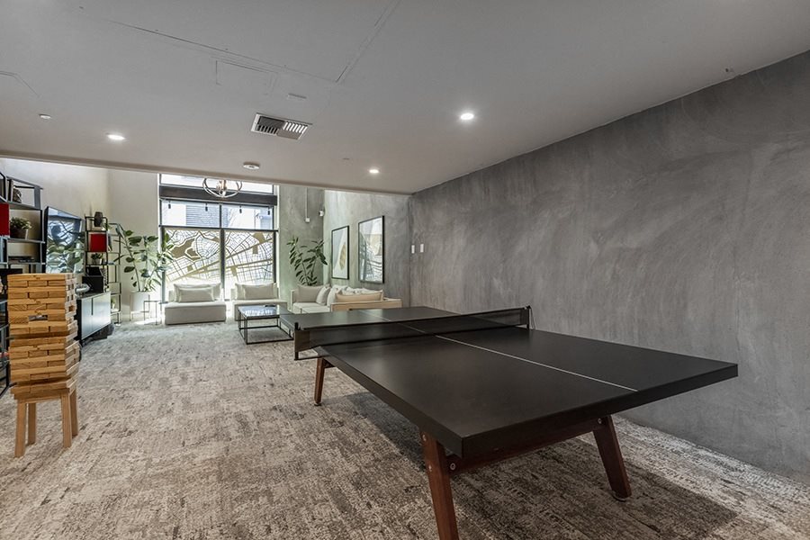 Apartments in Oakland CA - Residential Social Lounge Featuring Plenty of Exciting Amenities Such As Ping Pong Table